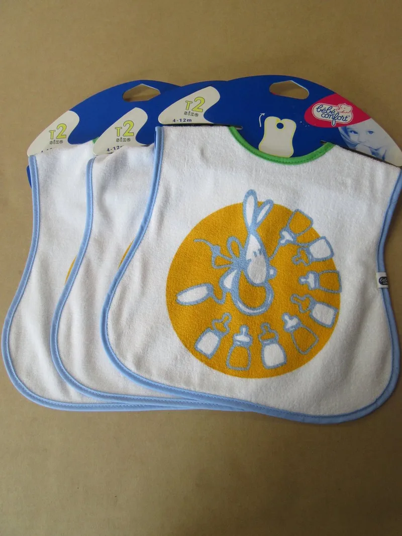 slabbetjes set 3stuks ( bavet ) bebe confort flessen by Bébé Confort in Wit met geel/blauw/groen – product photo