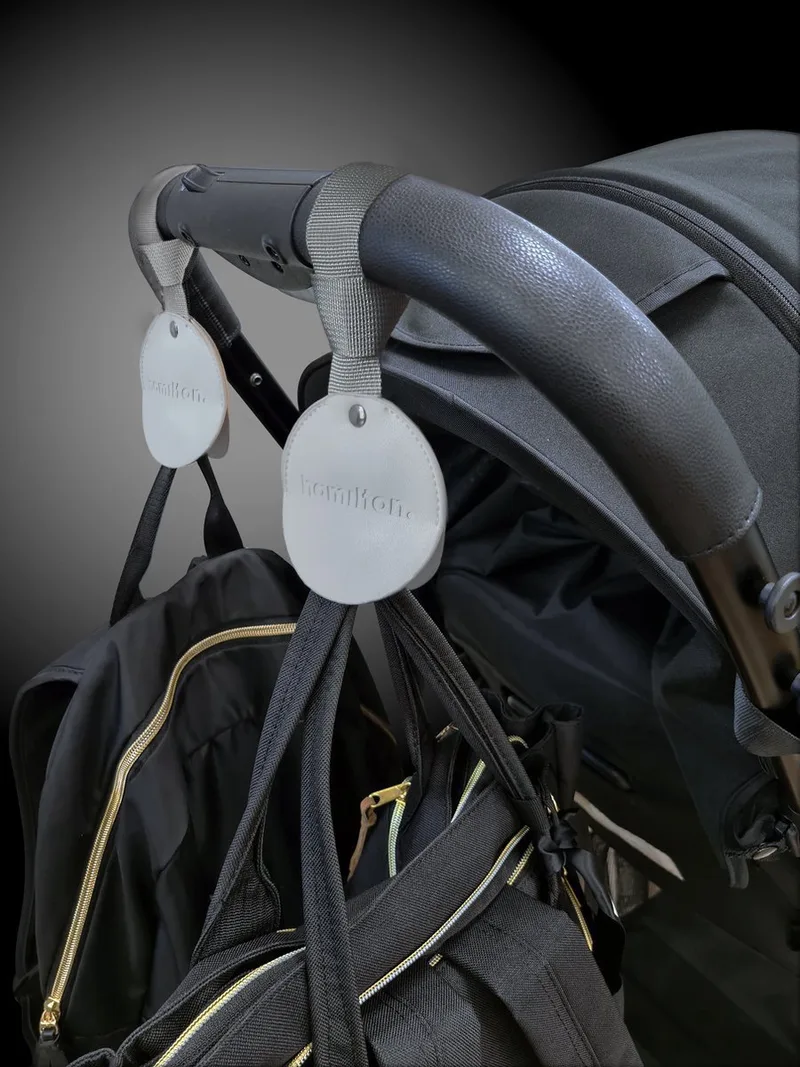 Buggy Haken - Extra Sterke Kinderwagen Ophanghaken tot 20KG - Kindvriendelijke Tassenhaak - Premium Kunstleer - Universele Wandelwagenklem by Hamilton by Yoop in Wit – product photo