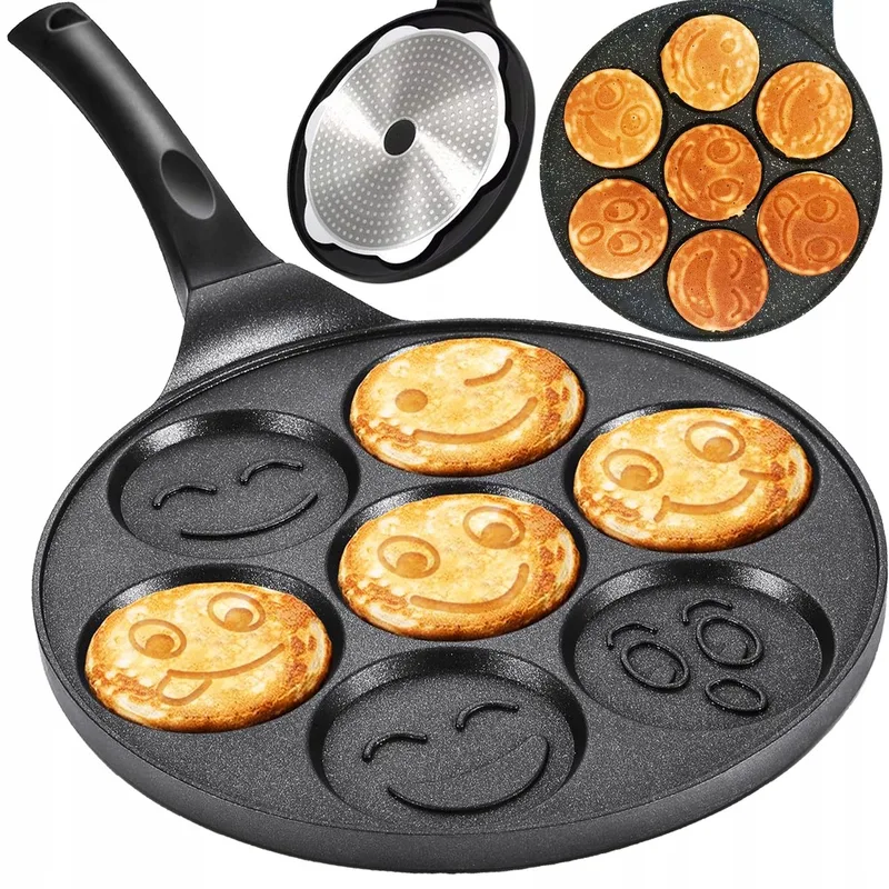 Pannenkoekenpan met 7 gezichtjes - Non-stick, voor alle warmtebronnen från Dille & Kamille i Svart – produktbild