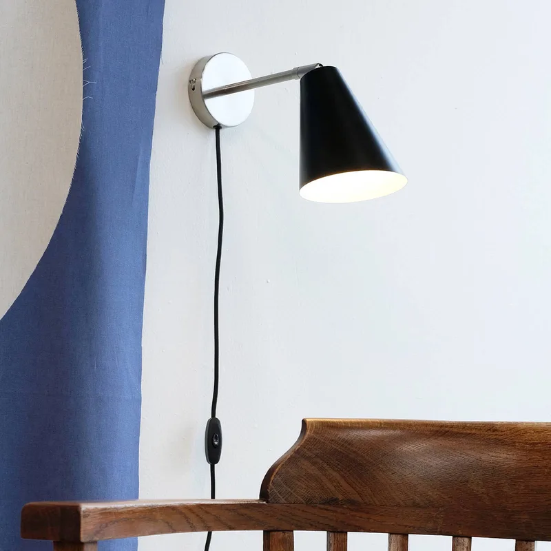 Oswald wandlamp zwart/staal de Dyberg Larsen en Zwart, staal geborsteld – photo du produit