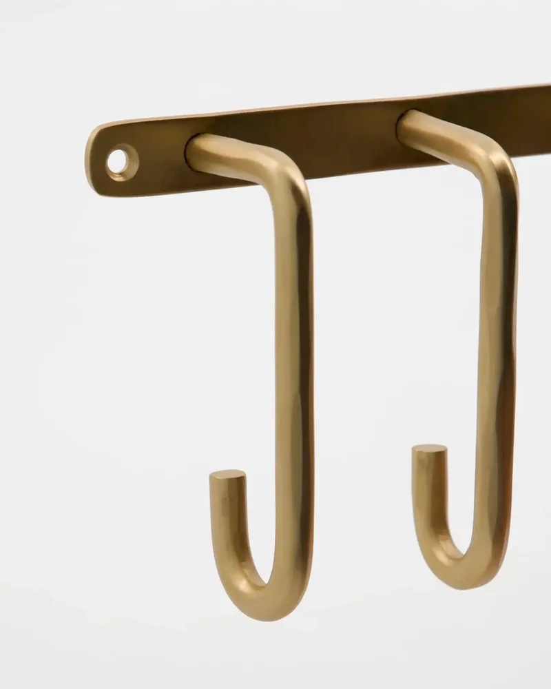 Kapstok Welo geborsteld messing 15cm by House Doctor in [gid://shopify/Metaobject/303390884175] – product photo