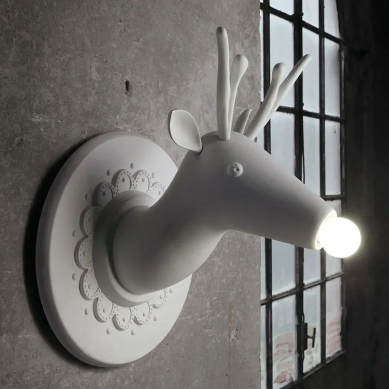 Marnìn - design-wandlamp van keramiek by Karman in Mat wit – product photo
