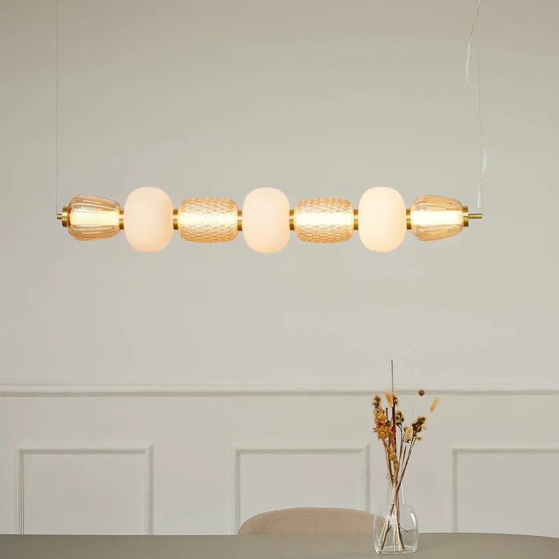 LED hanglamp Pearl 7, amber/goud, glas, 110 cm von LOOM DESIGN in Amber-transparant, Gold, Opaal – Produktfoto