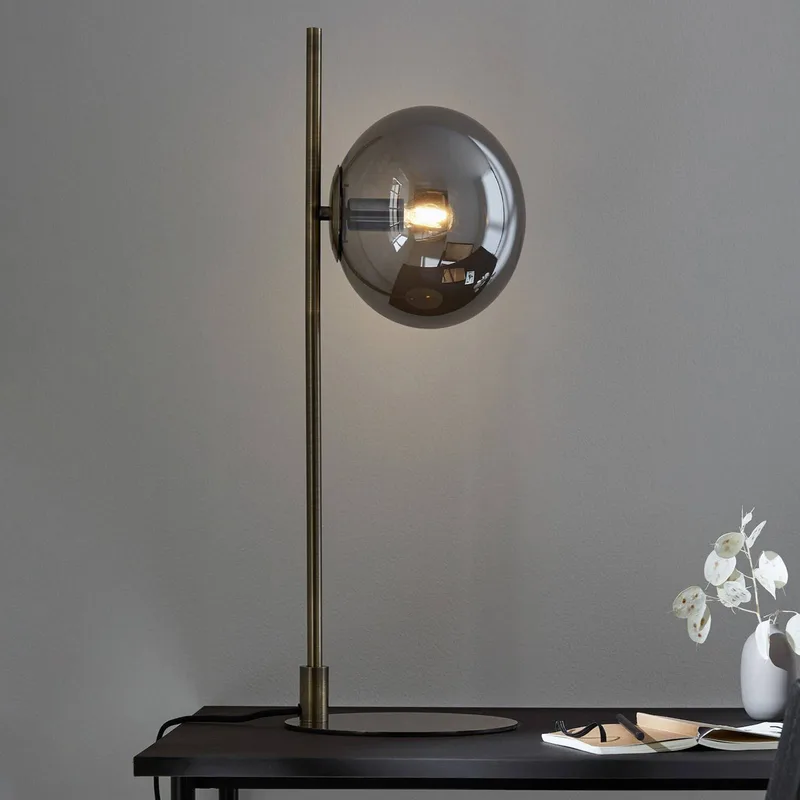 Dione tafellamp, messing/rookgrijs, glas, ijzer by Markslöjd in Brass, Rookgrijs – product photo