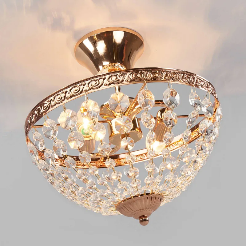 Flot designet loftlampe Hanaskog fra Markslöjd i Frans goud, Gennemsigtig – produktbillede