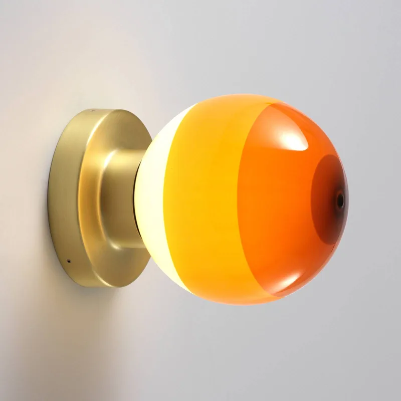 LED wandlamp Dipping Light A2, oranje/goud by Marset in Oranje/barnsteen, messing – product photo