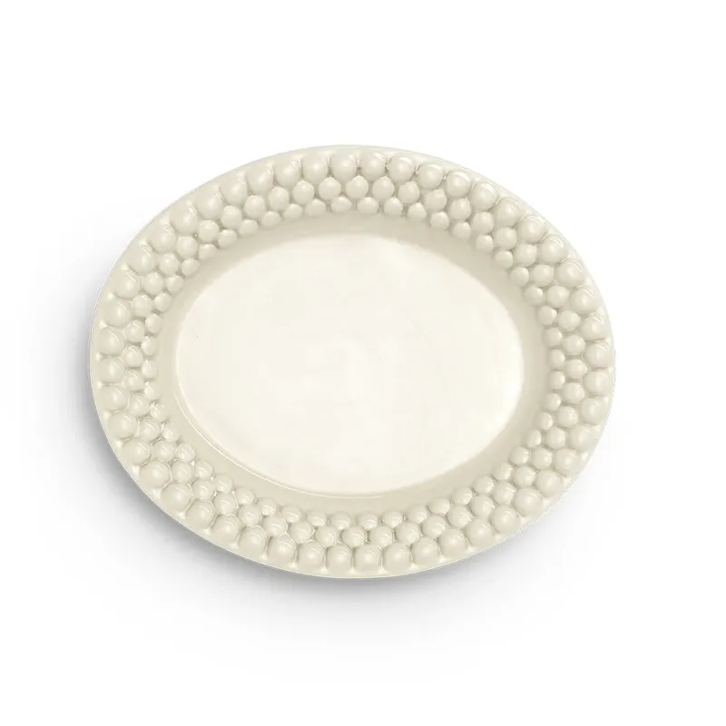 Bubbles ovaler Teller 20cm Sand by Mateus – product photo