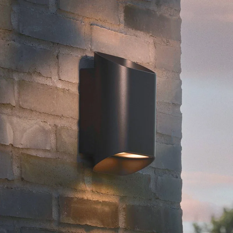 Buitenwandlamp Nico 22 Round, metaal, up/down, IP54 von Nordlux in Zwart – Produktfoto