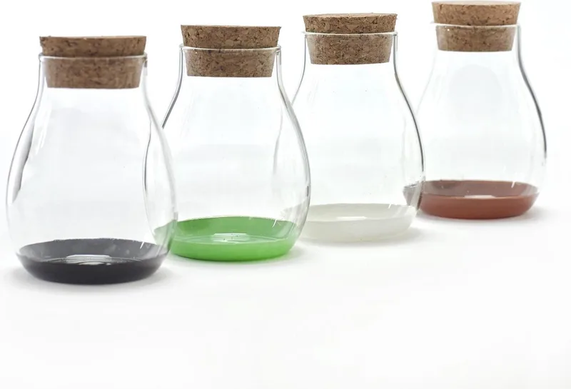 4 glazen opbergpotje met kurk deksel in diverse kleuren by Serax in Paars – product photo