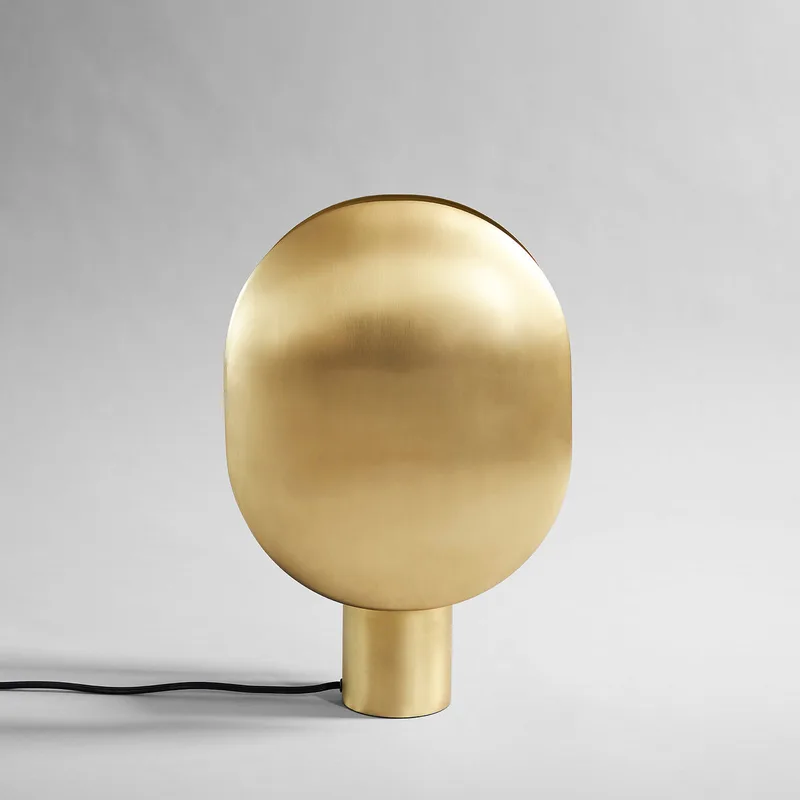Clam Table Lamp - Brass by 101 Copenhagen – product photo