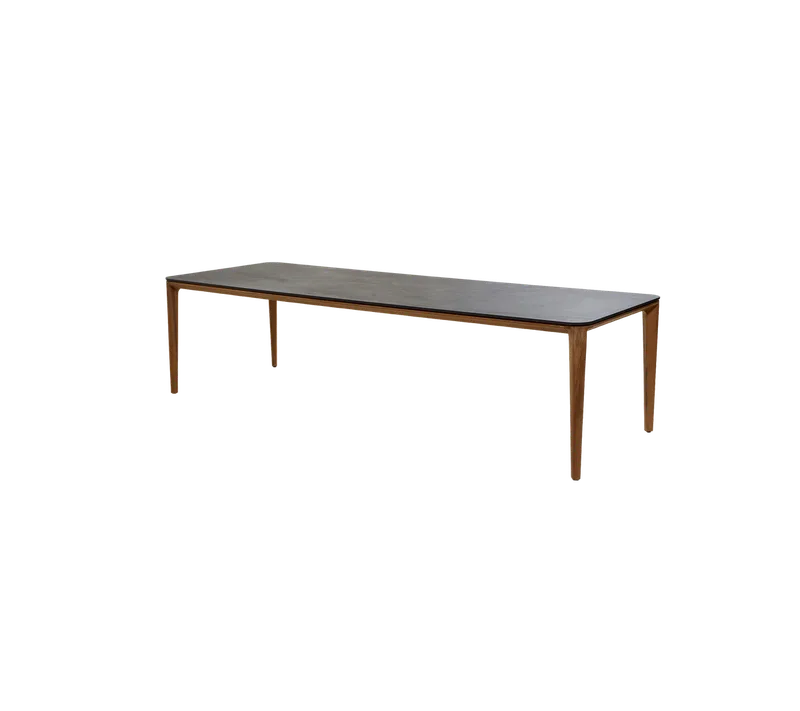 Aspect dining table, 280x100 cm by Cane-line in Teak, Fossil black, ceramic w/rounded corners – product photo