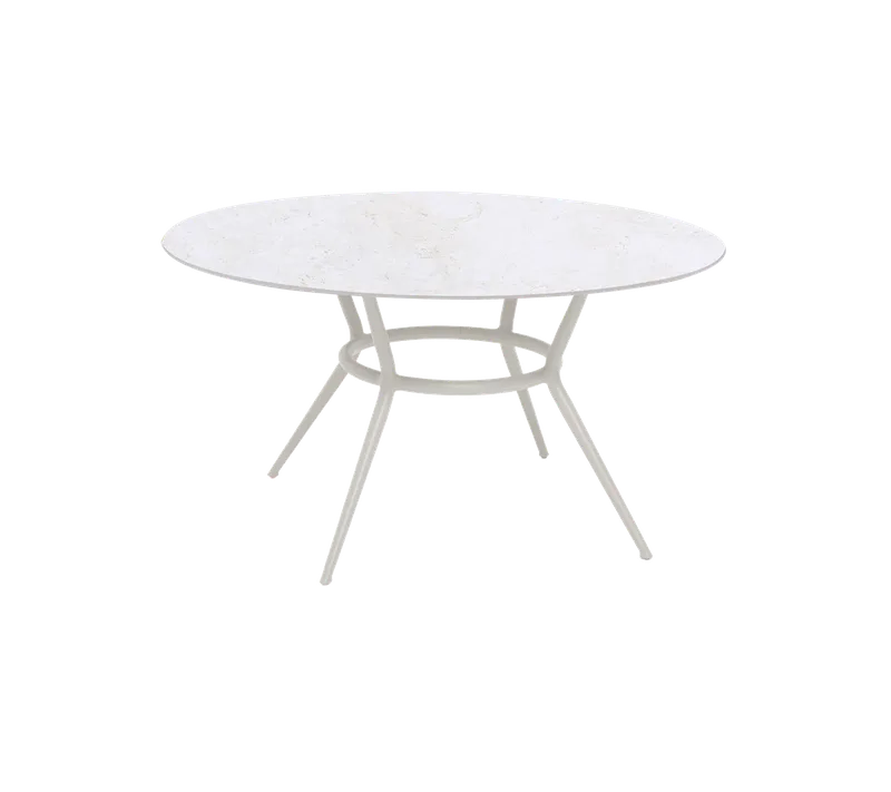 Joy dining table, dia. 144 cm by Cane-line in Sand, Aluminium, Travertine look, Ceramic – product photo