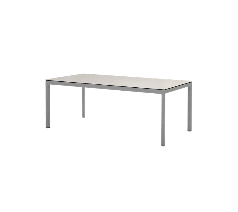 Drop dining table by Cane-line in Light grey, aluminium, Toscana sand, ceramic – product photo