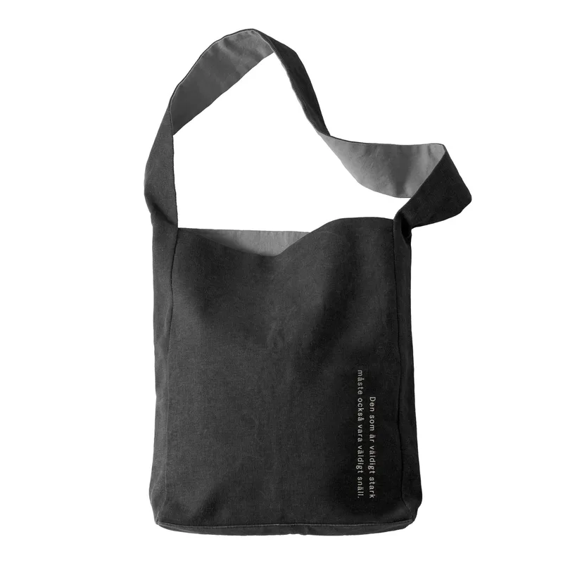 Astrid Lindgren Tote Bag by Design House Stockholm in Black (Den som är väldigt stark...) – product photo