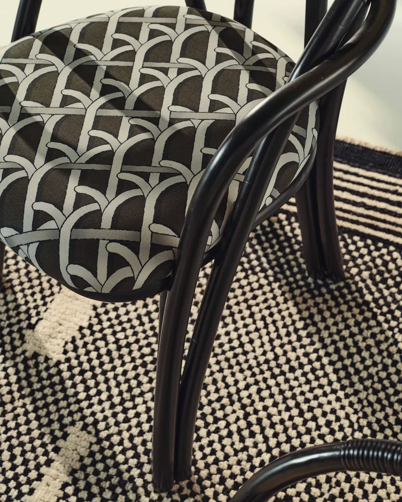Bistra Dining Armchair by GUBI in Reales Pattern, GUBI (003, Standard), Ebony Painted Rattan – interior photo 6 of 7