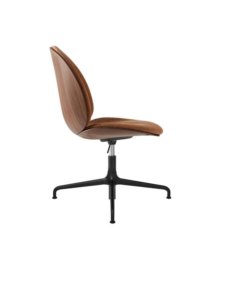 Beetle Meeting Chair, 3D Veneer & Front Upholstered by GUBI in Belsuede Special FR, Dedar (132, Standard), American Walnut Semi Matt Lacquered, Height adjustable 4-star base, Matt Black – product photo 1 of 3