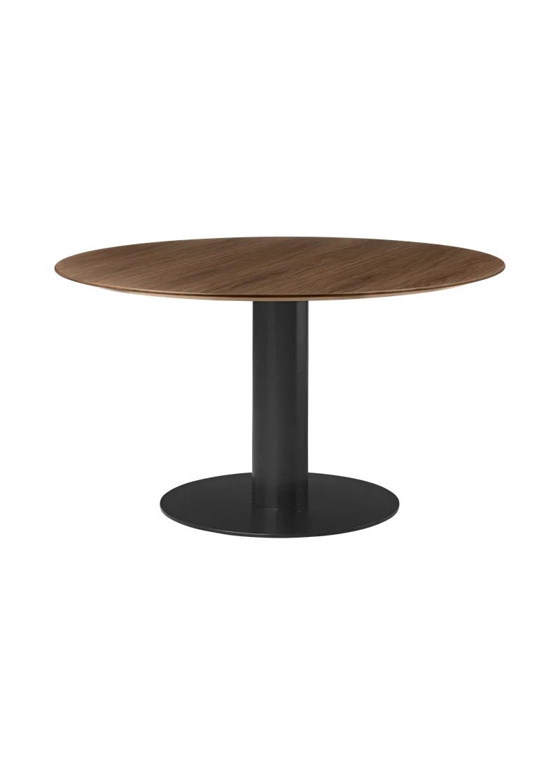 GUBI 2.0 Dining Table, Round by GUBI in American Walnut Semi Matt Lacquered, Ø130 cm, Black base – product photo