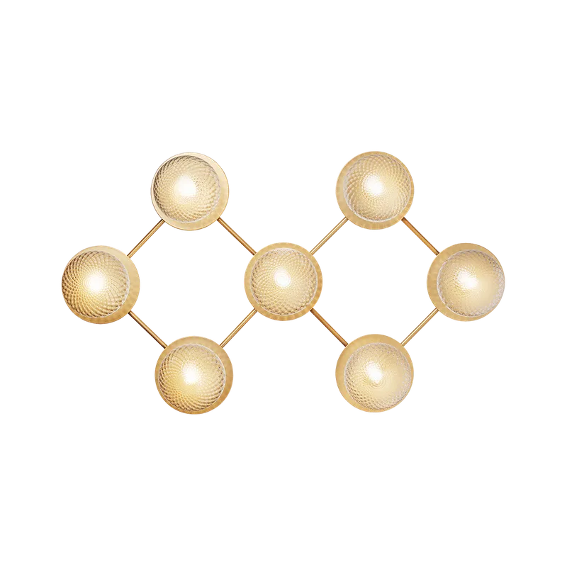 Liila 7 Væglampe by Nuura in Nordic gold / optic clear – product photo