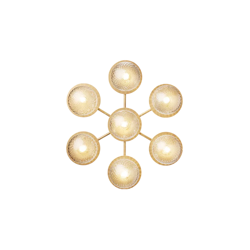 Liila Star Væglampe by Nuura in Nordic gold / optic clear – product photo